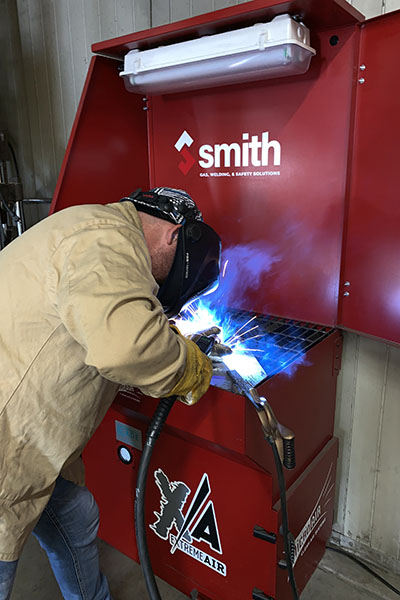 S.J. Smith employee welding at Decatur location.
